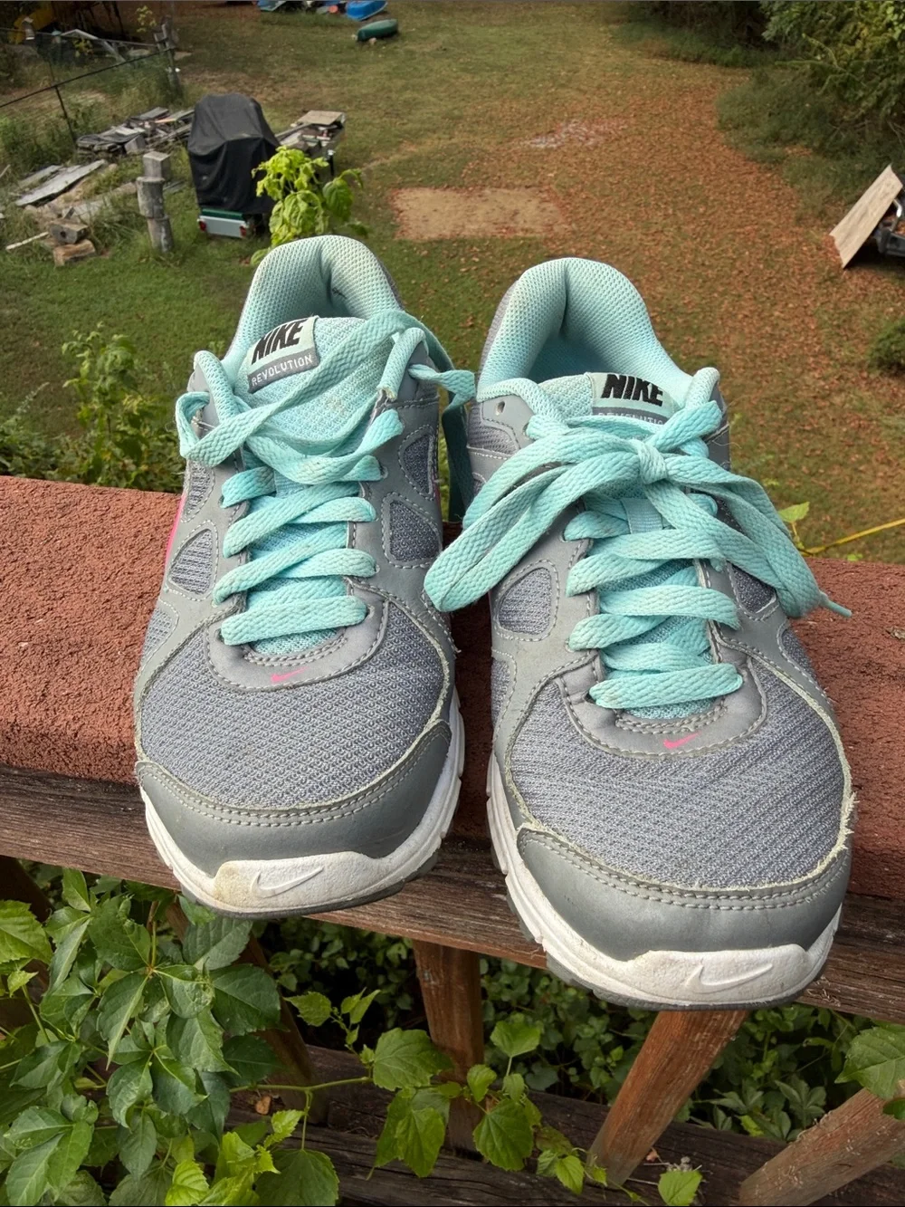 Nike Women's Gray Athletic Sneakers with Pink Swoosh and Mint Laces